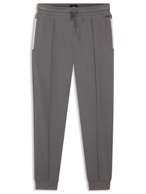 CONTRAST-BINDING TRACKSUIT BOTTOMS IN A COTTON BLEND
