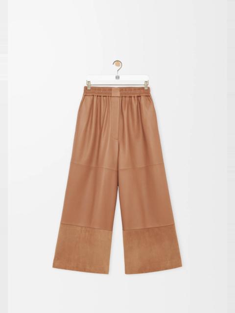 Cropped trousers in nappa lambskin and suede goatskin