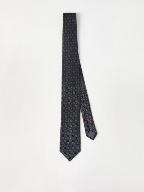 Geometric patterned silk tie