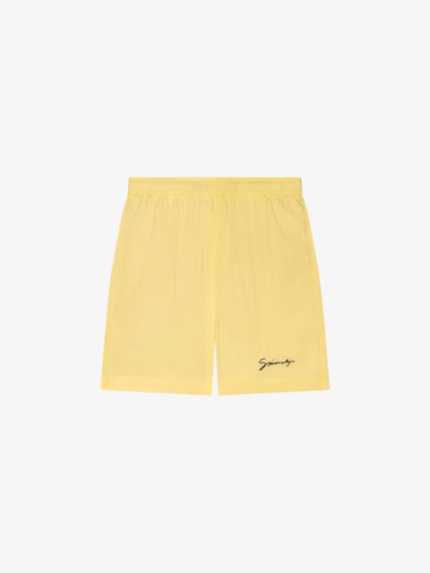 SWIM SHORTS WITH GIVENCHY SIGNATURE