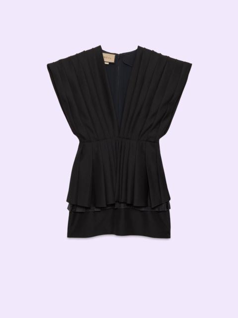 Wool dress with pleats
