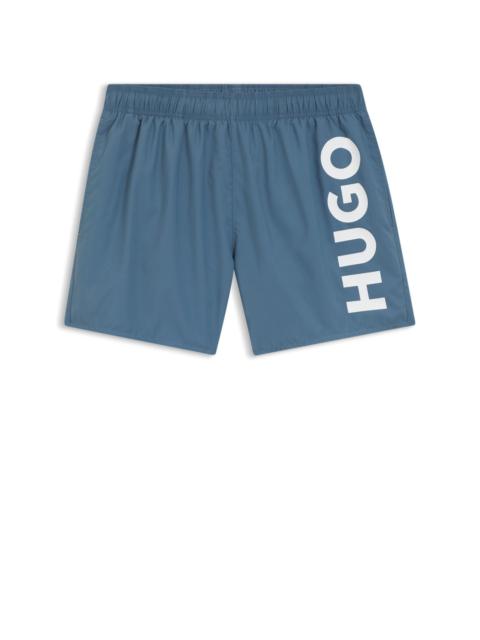 SWIM SHORTS WITH VERTICAL LOGO PRINT