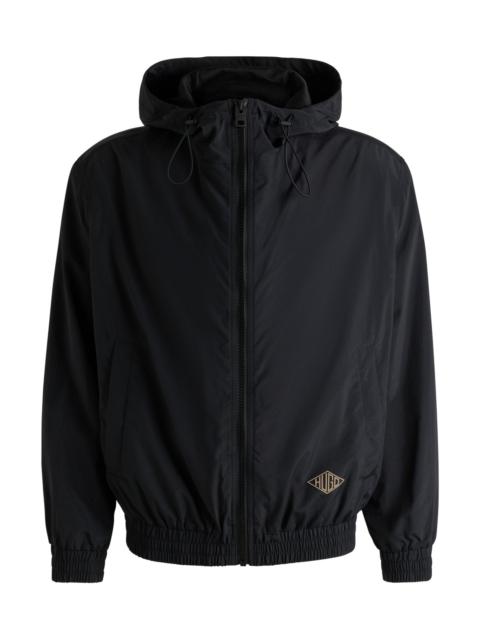 HOODED WINDBREAKER JACKET WITH MESH LINING