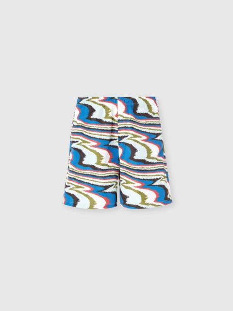 Long swim shorts with irregular zigzag print