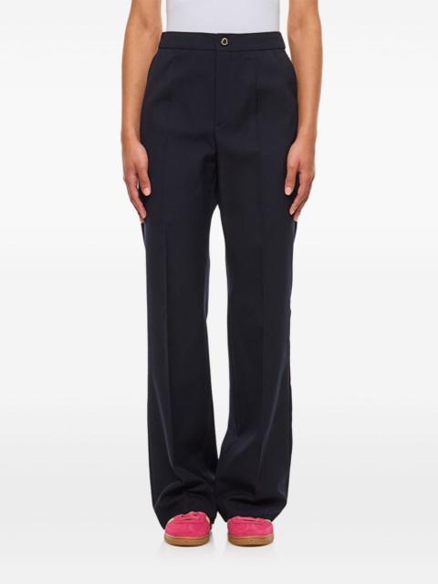 pressed-crease trousers