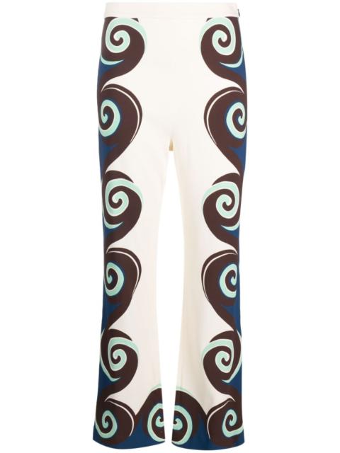 Stretch geometric-print trousers