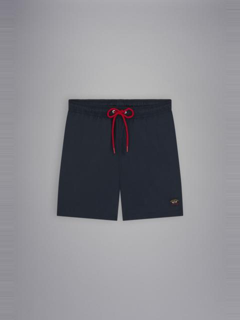SWIM SHORTS WITH ICONIC BADGE