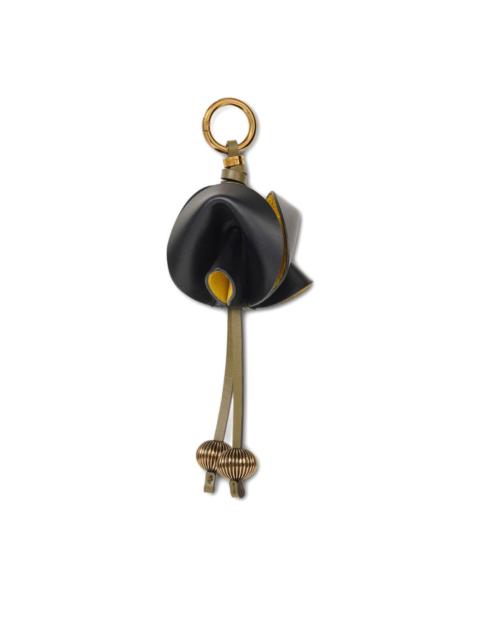 flower-shaped leather charm