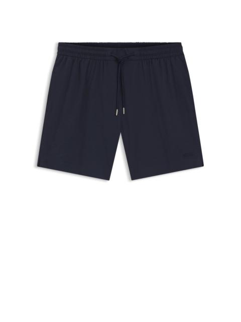 QUICK-DRY SWIM SHORTS IN STRETCH SEERSUCKER