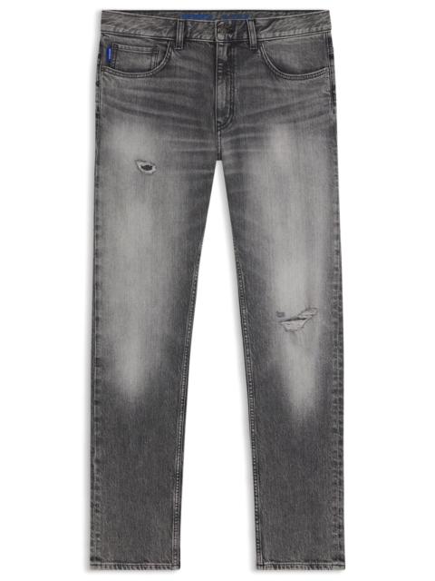 SKINNY-FIT JEANS IN DISTRESSED GREY STRETCH DENIM