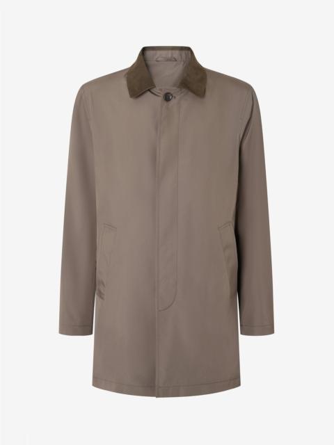 Dark green trench coat made from technical poplin