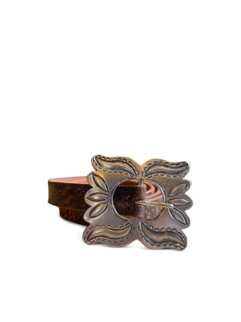 silver-buckle leather belt