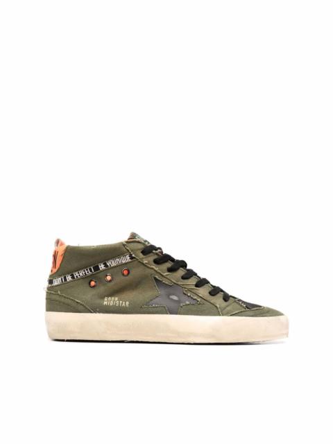 distressed hi-top sneakers