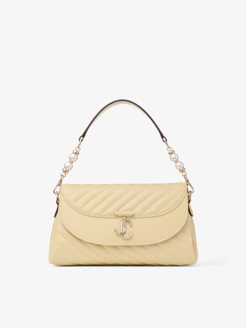 Avenue Curve Top Handle
Buttermilk Quilted Biker Leather Shoulder Bag with Pearl Detail