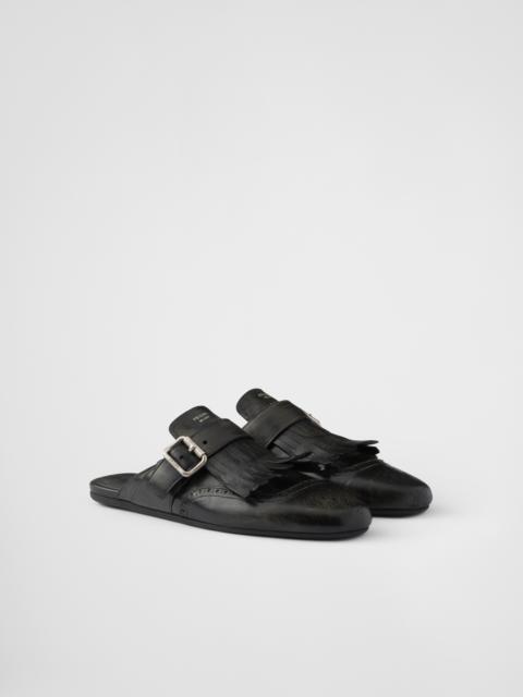 Shuffle fringed leather mules