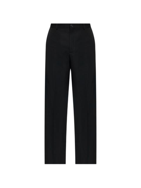 button fastening trousers