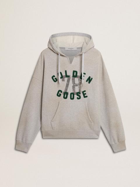 Hooded sweatshirt in worn gray with embroidered vintage logo