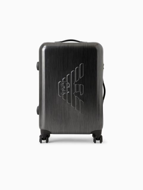 ABS medium trolley suitcase with oversized, embossed eagle