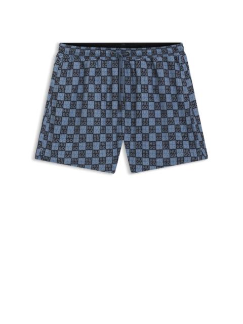 SWIM SHORTS WITH CHECKERBOARD LOGOS
