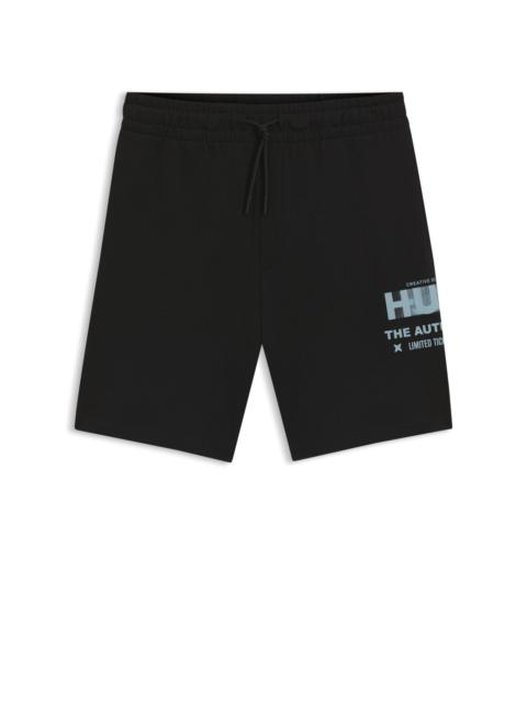 COTTON-TERRY SHORTS WITH MIXED LOGO ARTWORK