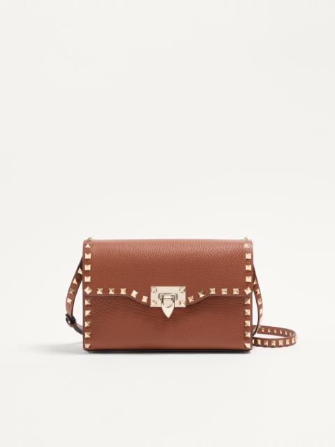 SMALL ROCKSTUD GRAINY CALFSKIN CROSSBODY BAG