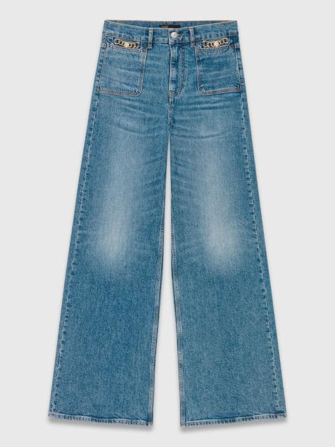 Flared jeans with chain