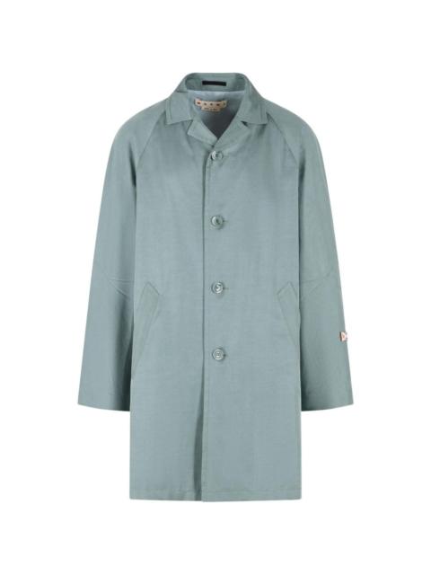 buttoned trench coat