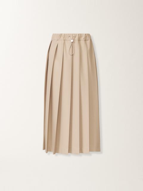 Pleated skirts in techno tailoring