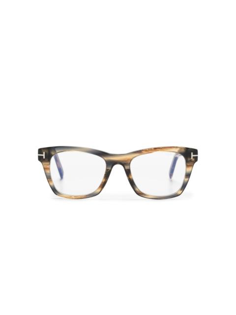 tortoiseshell-effect round-frame optical glasses