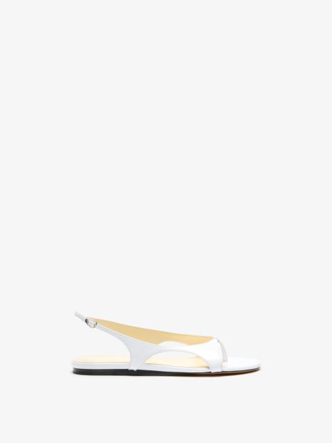Slash Flat Thong Sandals in Slick Nappa