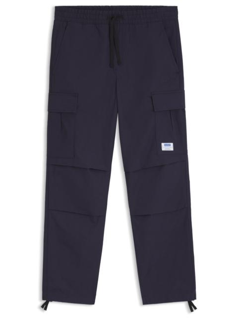 RELAXED-FIT CARGO TROUSERS IN RIPSTOP COTTON
