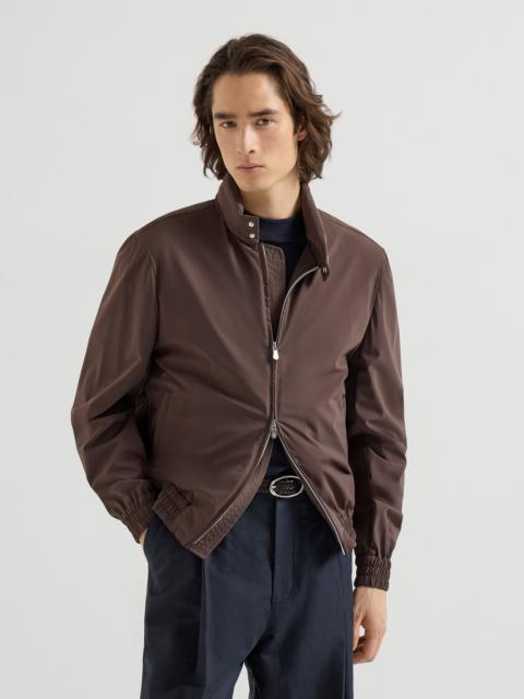 Bonded nylon outerwear jacket with packable hood