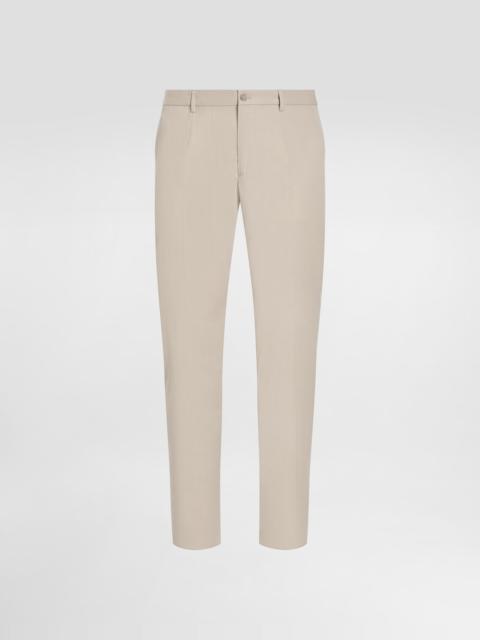 Stretch cotton pants with branded tag