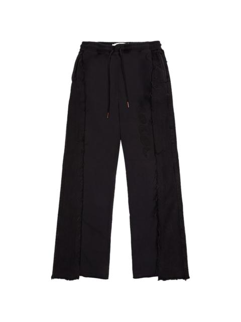 frayed track pants