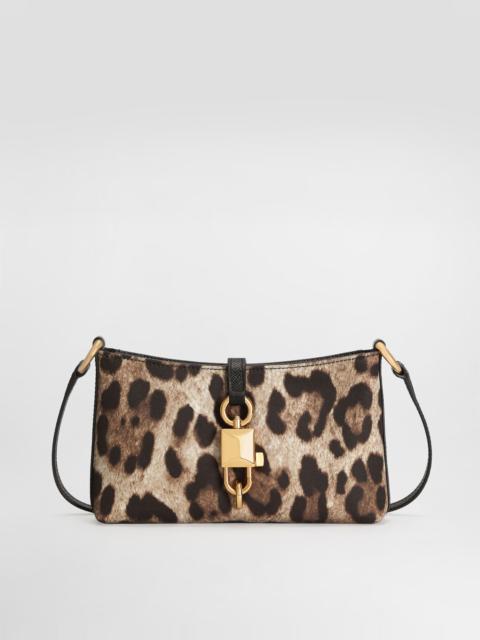 Leopard-print lock shoulder bag
