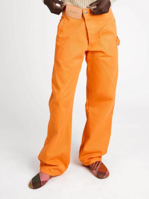 Bright orange twisted-denim jeans