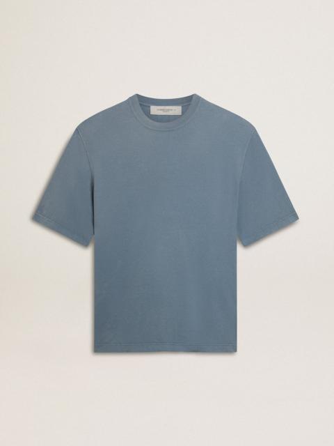 Unisex cotton T-shirt in baby blue with reverse print on the back