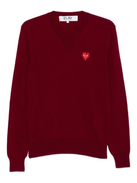 heart-emblem V-neck sweater