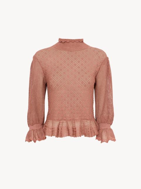 RUFFLED PUFF-SLEEVE SWEATER IN A LUREX KNIT