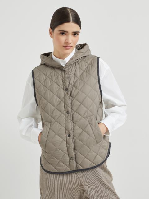 Lightweight matte nylon quilted vest with Thermore® padding and hood