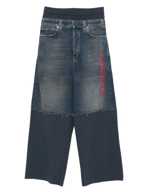 embroidered-patchwork trousers