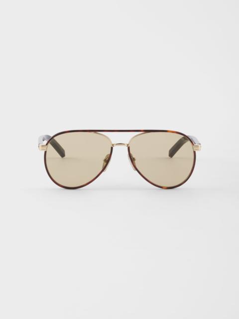 Prada sunglasses with the iconic metal plaque
