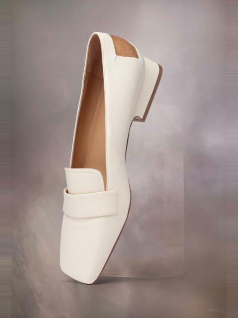 Four stitches décortiqué loafers