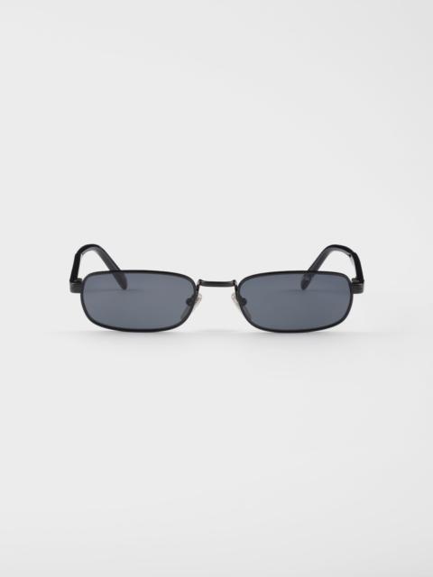 Sunglasses with the iconic metal plaque