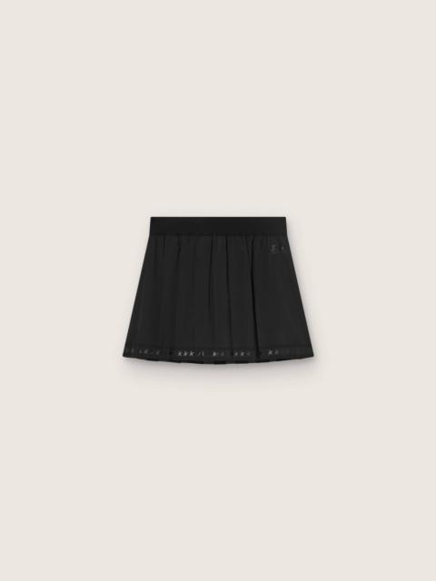 Pleated sports miniskirt in black