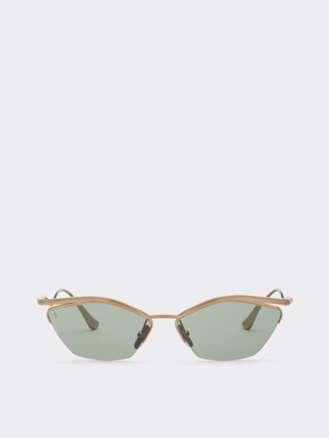 Ferrari sunglasses in shiny gold-colored titanium with dark green lenses