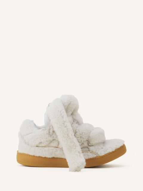 CURB SNEAKERS IN SHEARLING