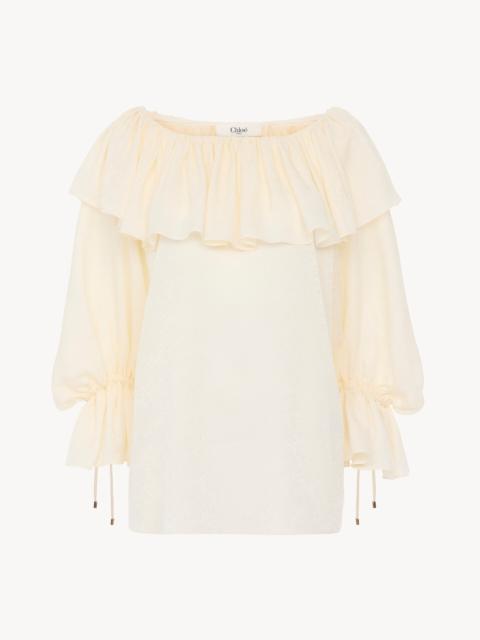 FLUID RUFFLE TOP IN SILK JACQUARD