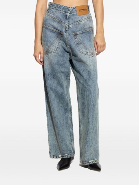 distressed V-yoke jeans