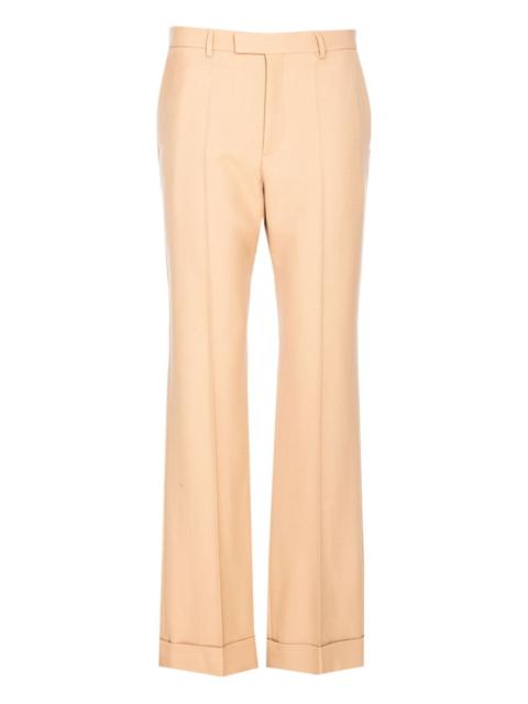 pressed-pleats pants